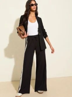 Friends Like These - Effet froissé Pantalon ample en jersey Bande noire Outlet