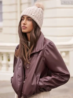 Lipsy - Chapeau à pompon côtelé scintillant beige Hot