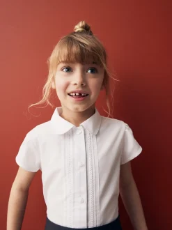 Next Blanc - Chemisier scolaire à manches bouffantes et bordures en dentelle (3-14ans)