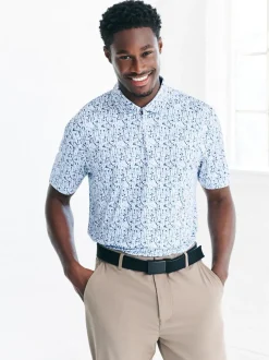 Next Blanc - Polo de golf à imprimé géométrique actif New