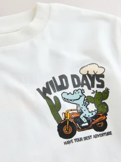 Next - T-shirt Manches courtes Back Imprimé (3mths-7yrs) Blanc dinosaure surdimensionné Outlet