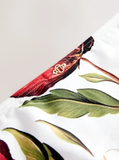 Next Blanc/Rouge Fleuri - Bas de bikini avec éléments métalliques Hot