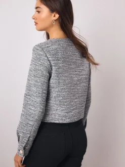 Next Bleu - Veste bouclée sans col festonné Best