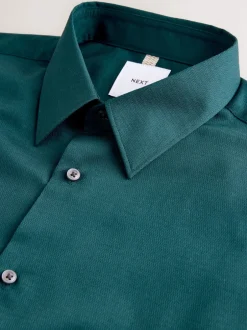 Next - Ajustement régulier - Chemise élégante texturée facile d’entretien à poignets simples Bleu de sarcelle Hot