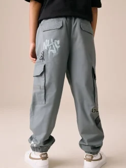 Next - Pantalon cargo (3-16ans) Bleu motif graffiti Online