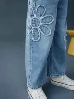 Next Bleu moyen - Jean Jambe large Fleuri (3-16ans)