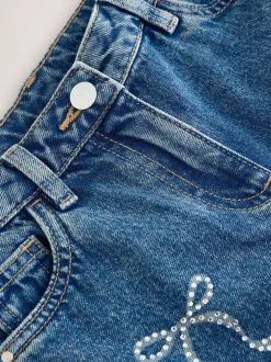 Next Bleu moyen - Jean orné d’un large imprimé fleuri (3-16ans) Coupe ballon Outlet