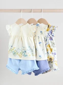 Next Bleu/blanc à fleurs - Ensemble t-shirt et short à volants bébé 6 pièces (0mois-2ans) Discount