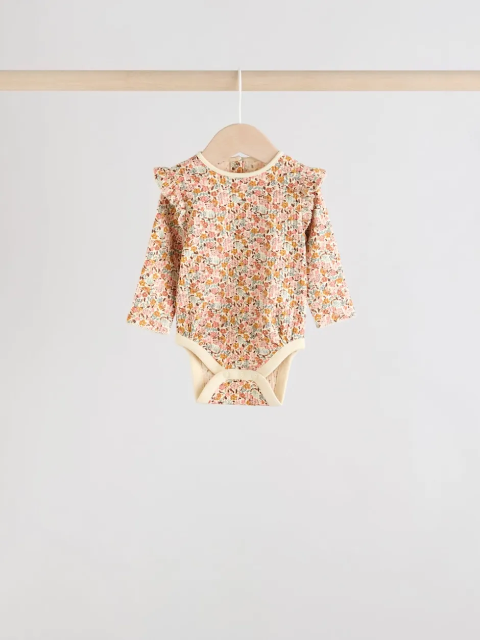 Next Bleu/Crème/Coral Ditsy - Body à volants et manches longues bébé Lot de 4 (0mois2ans)