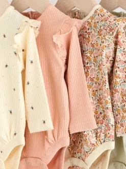 Next Bleu/Crème/Coral Ditsy - Body à volants et manches longues bébé Lot de 4 (0mois2ans)