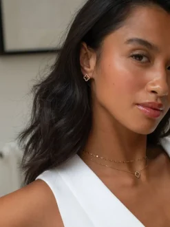 D.Louise Boucles d’oreilles imperméables avec clous de trèfle