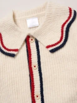 Miss Cardigan True Knit blanc avec jupe à carreaux