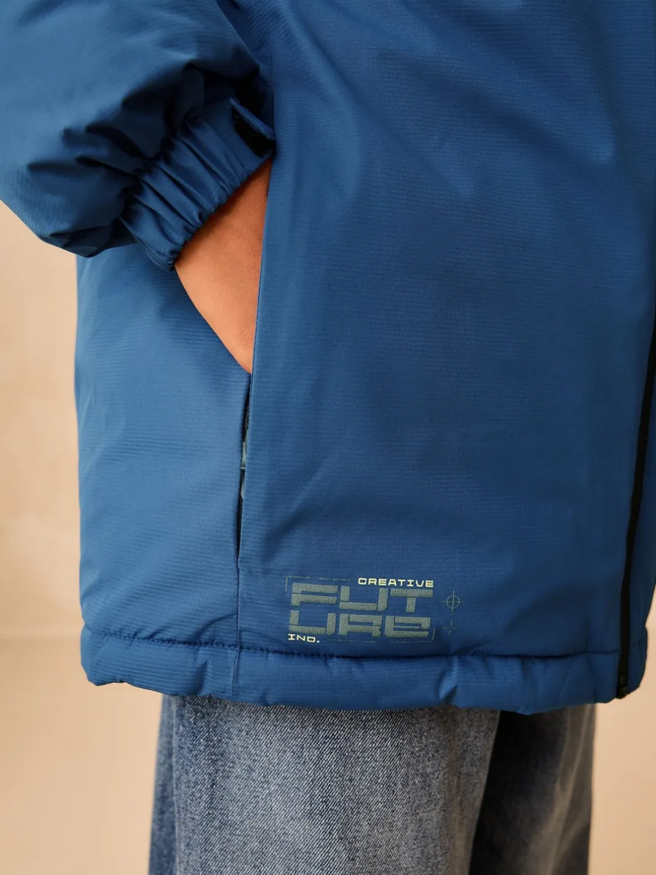 Next color block bleu - Manteau matelassé intérieur imperméable (3-16ans)