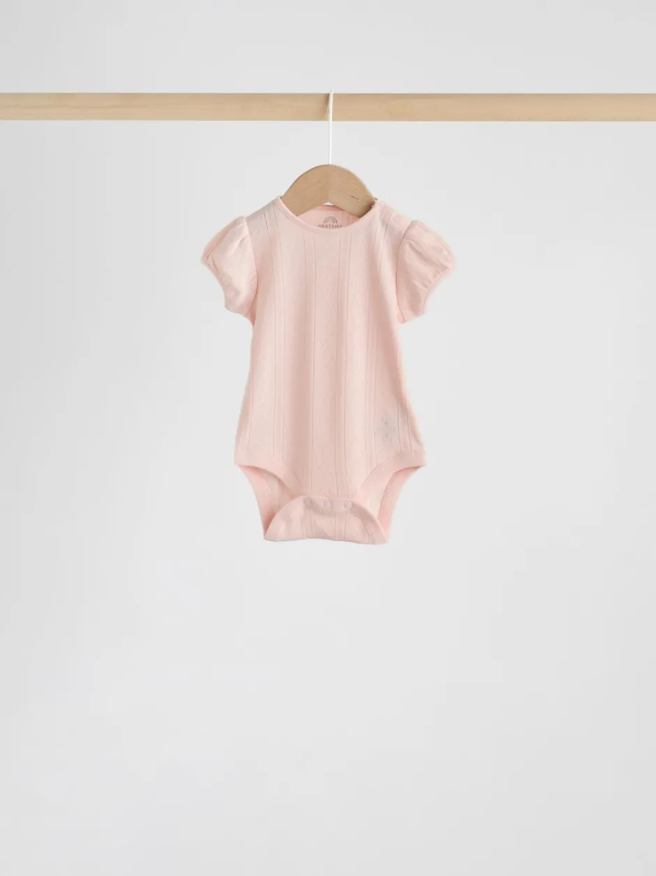 Next Coloris pastel - Lot de 5 bodys à manches courtes en maille pointelle pour bébé