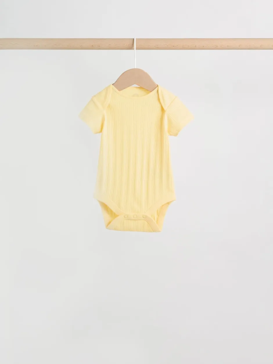 Next Coloris pastel - Lot de 5 bodies bébé à manches courtes