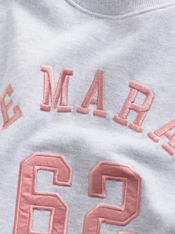 Next Gris - Sweat-shirt à col rond à manches longues en satin appliqué 'Le Marais' City Best