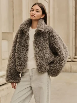 Next Gris - Veste zippée à col cheminée en fausse fourrure Online