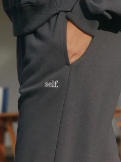 self. - soi-même. Pantalon de jogging coupe large Gris de charbon de bois New