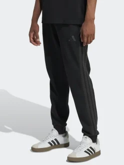 adidas Ground noires - Essentiels Pantalon de jogging polaire à rayures 3 Outlet
