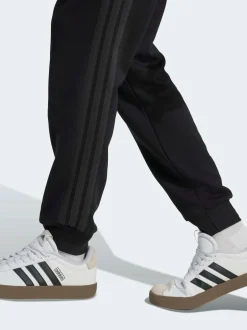 adidas Ground noires - Essentiels Pantalon de jogging polaire à rayures 3 Outlet