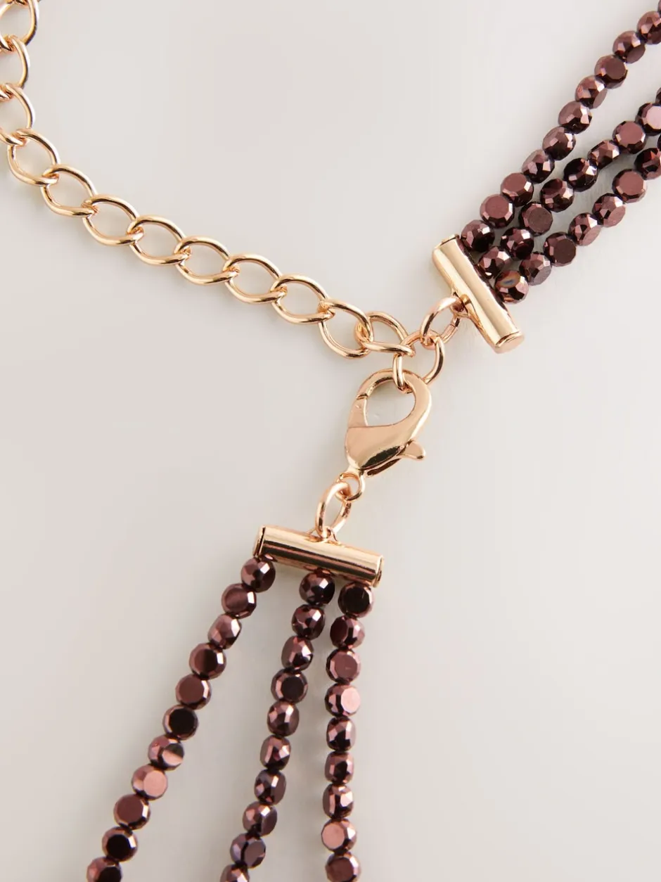 Next Marron chocolat - Ceinture Skinny métallisée à perles étagées New