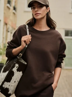 Next - Sweat-shirt long Essentiels coupe décontractée avec poches Marron chocolat Online