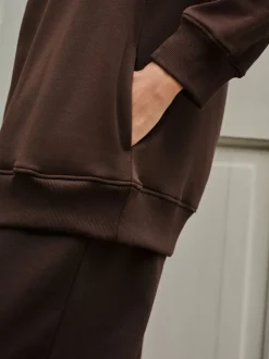 Next - Sweat-shirt long Essentiels coupe décontractée avec poches Marron chocolat Online