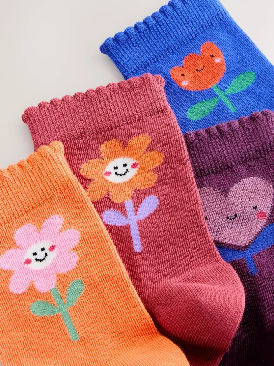 Next Multicolore - Lot de 4 paires de chaussettes en coton riche en fleurs et cœur