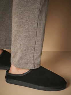 Next Noir - Chaussons mules en daim doublés de fausse fourrure Signature Online