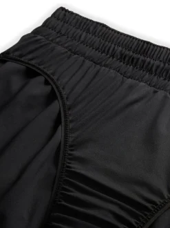 Nike - Un short Dri-FIT Mid Rise 3 pouces doublé Noir New