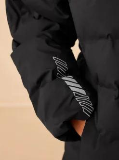 Next Noir - Veste imperméable à capuche de poids moyen (3-17ans)