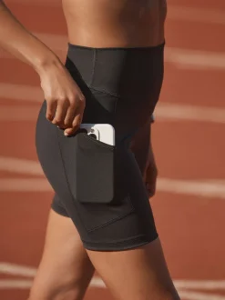 Next Noir avec poches - Short Sports Dry Tech Tummy Control