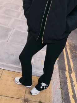 Never Fully Dressed Noir brodé - Leggings évasés en coton New