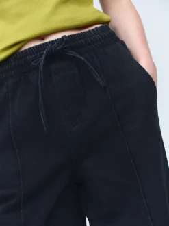 Next Noir lavé - Jogging en jean large à plis nervurés