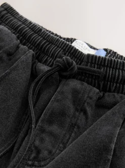 Next Noir lavé - Jogging en jean large à plis nervurés