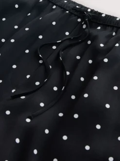 Next Noir/Blanc à pois - Pantalons en satin à jambe large et taille ceinturée Hot