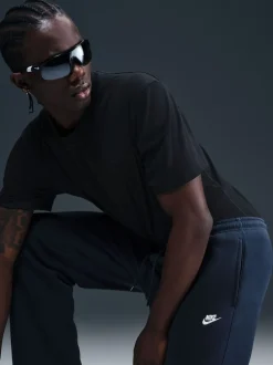 Nike Obsidienne - Pantalon de jogging Club en polaire coupe large Discount