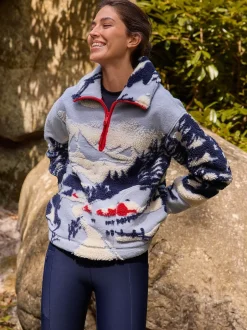 Next - Polaire douce en polaire en peau de mouton à col zippé Paysage d’hiver bleu à imprimé graphique New