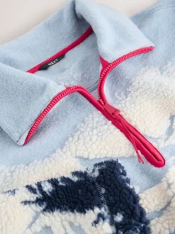 Next - Polaire douce en polaire en peau de mouton à col zippé Paysage d’hiver bleu à imprimé graphique New