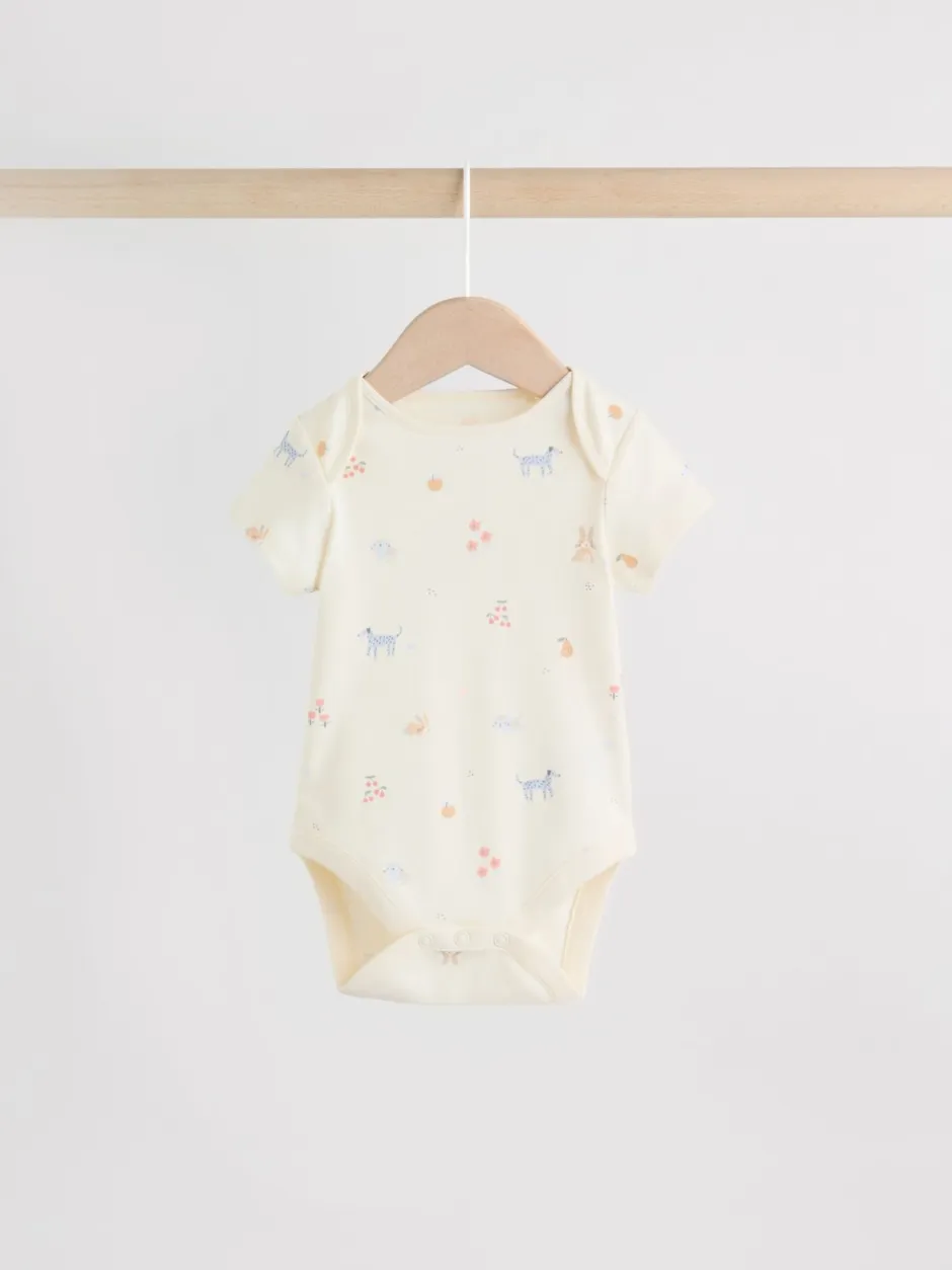 Next Personnage pastel multicolore - Lot de 7 bodies bébé à manches courtes New