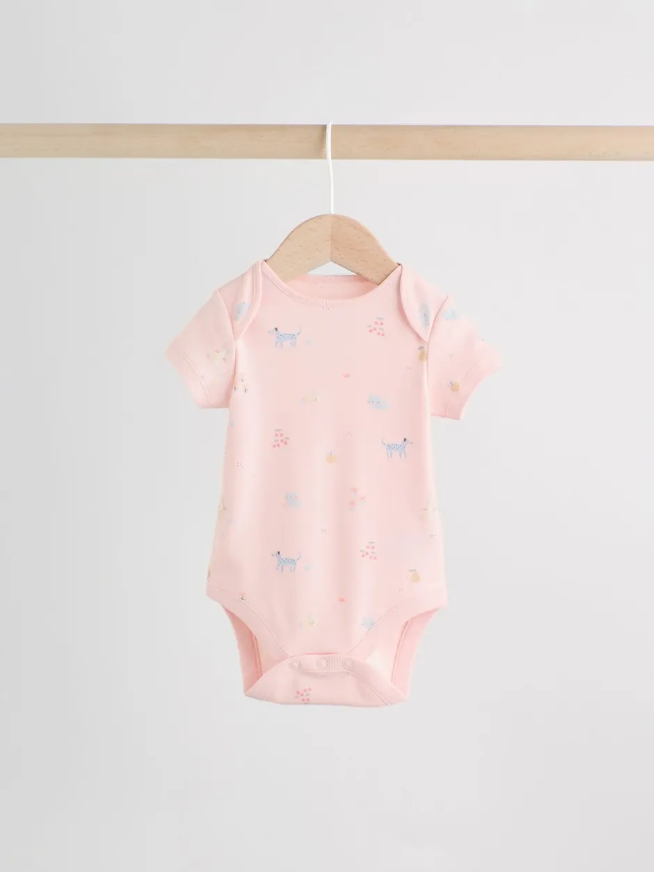 Next Personnage pastel multicolore - Lot de 7 bodies bébé à manches courtes New