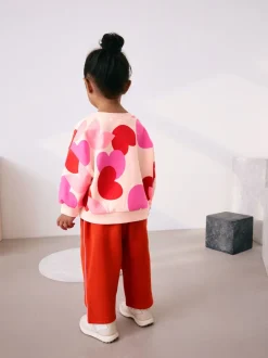 Next - Ensemble Sweat-shirt et jogging Coupe ballon (3mois -7ans) Rose/rouge motif cœurs Online