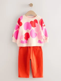 Next - Ensemble Sweat-shirt et jogging Coupe ballon (3mois -7ans) Rose/rouge motif cœurs Online
