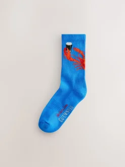 Next Rouge/Bleu - Lot de 2 chaussettes de sport sous licence Guinness Sale