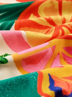 Next Rouge/Vert Tropical - Maillot de bain Urim Tummy Control à décolleté plongeant New