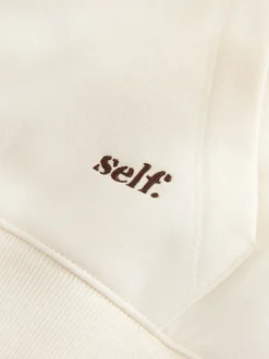 self. soi-même. Sweat-shirt à col zippé