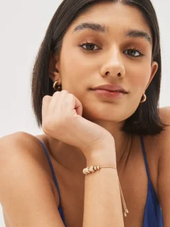 Next Tonalité d'or - Bracelet pully scintillant avec maïs soufflé perlé New