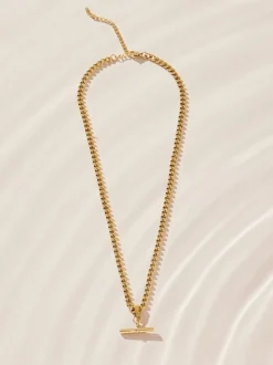 Next Tonalité d'or - Collier en acier inoxydable avec barre en T Outlet