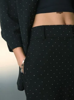 Next Velours noir - Chaussures plates Forever Comfort® à bout pointu et bride arrière à nœud Hot