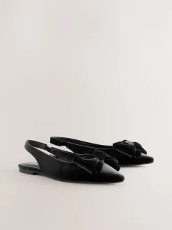 Next Velours noir - Chaussures plates Forever Comfort® à bout pointu et bride arrière à nœud Hot